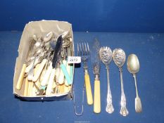 A quantity of cutlery including fish knives, serving spoons and forks, teaspoons,