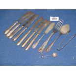 A quantity of Sheffield silver cutlery including; butter knives, jam spoon, sugar tongs, salt spoon,