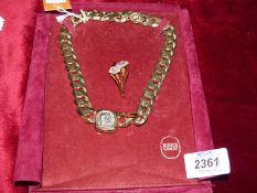 A Bijoux Casico gent's chain with pendant and a Swarowski brooch.