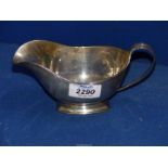 A silver Sauce Boat, Birmingham 1935, makers William Greenwood and Sons.