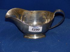 A silver Sauce Boat, Birmingham 1935, makers William Greenwood and Sons.