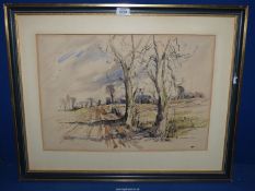 A framed and mounted ink/ wash painting depicting a country landscape, signed lower right P.