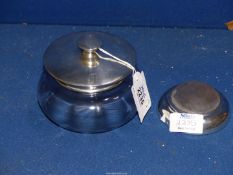 A glass powder bowl with star cut base and silver lid, Birmingham 1921 (4" diameter),