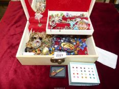 A Musical jewellery box and contents of a quantity of miscellaneous costume jewellery.
