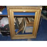 A late Victorian heavy gilt gesso frame, aperture 20'' x 28''.
