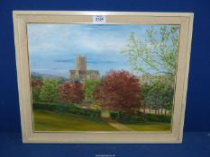 A framed Oil on board depicting a Cathedral and parklands, initialled lower right K.M.W.