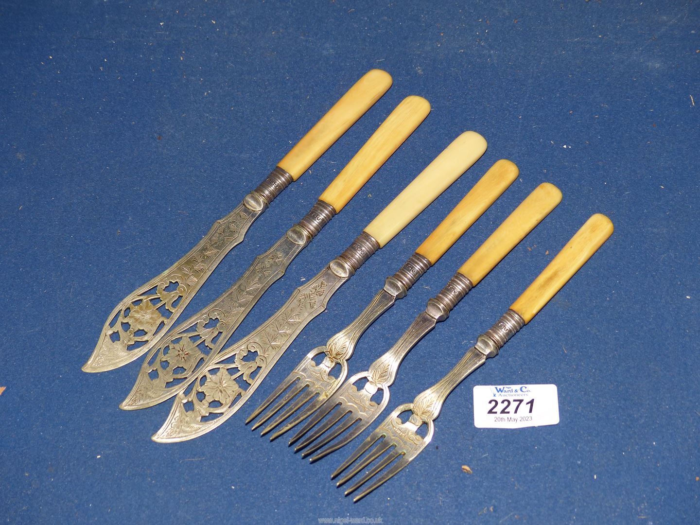 A set of three fish knives and forks having Sheffield silver collar and engraved and open pierced - Image 2 of 2