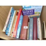 A box of books including 'Practical Clock Repairing', 'Badges of The British Army',