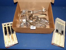 A quantity of silver plated cutlery, bone handled knives etc.