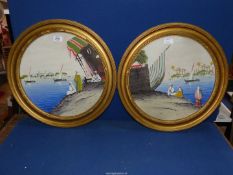 A pair of circular framed Watercolours depicting Arabian river scenes, no visible signature.