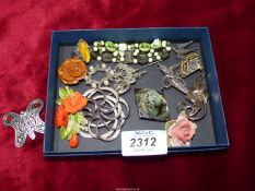 A small quantity of costume jewellery including brooches, ring, bracelet etc.