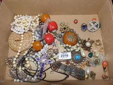 A quantity of costume jewellery including; necklaces, beads, clip on earrings, brooches, rings,