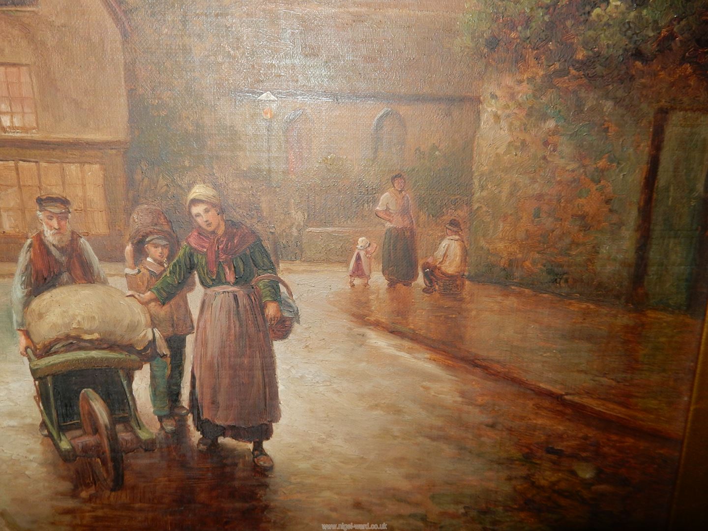 A large gilt framed Oil on canvas of a Village with figures walking down a street, - Image 6 of 7