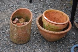 Four Terracotta pots.