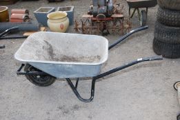 A builders wheelbarrow on pneumatic tyre