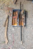 Two axes, carpenters vice, Stilsons, walking cane etc.