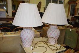 Two table lamps with shades.