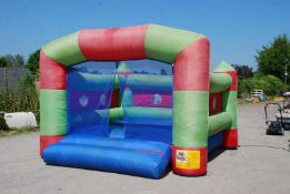 A "Kit for Kids" Bouncy Castle with electric fan, good working order.