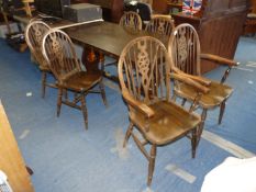 A dining room table and six chairs.