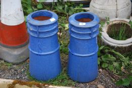 Two blue painted chimney Pots, 18'' high x 8'' diameter.