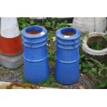 Two blue painted chimney Pots, 18'' high x 8'' diameter.