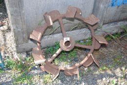 An iron spade lug wheel,