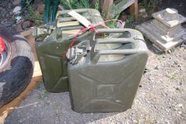 Two military Jerry cans, 2018 and 1996.