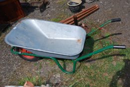 A B&Q galvanised wheelbarrow with pneumatic tyre.