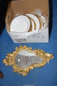 A Cherub mirror and quantity of 'Mono' gilt rimmed china.