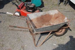 A wheelbarrow with solid tyre.