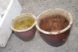 Two glazed pots.