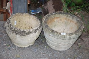 Two concrete planters, one @ 14 1/2" x 9'' high and one @ 12'' x 9'' high.