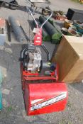 A Rover 45 Reel cylinder mower with grass box, good compression at time of lotting,