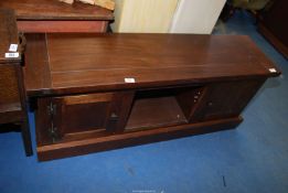 A long dark wood TV cabinet with two side cupboards, 50'' wide x 30 3/4'' deep x 21'' high,
