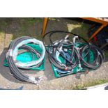 A quantity of mixed size hydraulic hoses, BSP, JIC and metric.