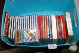 A quantity of Beetles CDs.