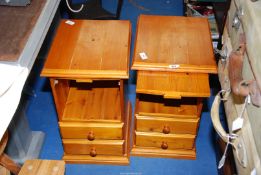 A pair of Pine bedside cabinets.
