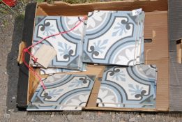 A quantity of 8" square tiles in blue and grey pattern.