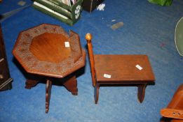 A small table a/f. and a footstool.