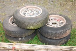 Five Aluminium four stud wheels and 165 x R13 tyres (previously off Hillman Avenger).