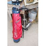 A golf bag,Life tech trolley and seven golf clubs.