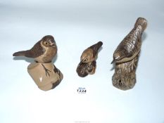 Three Poole Pottery birds including Robin on a flowerpot,(chip to beak) Tree creeper and Wren.