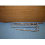 Five walking sticks including two with silver bands, one thumbstick etc.