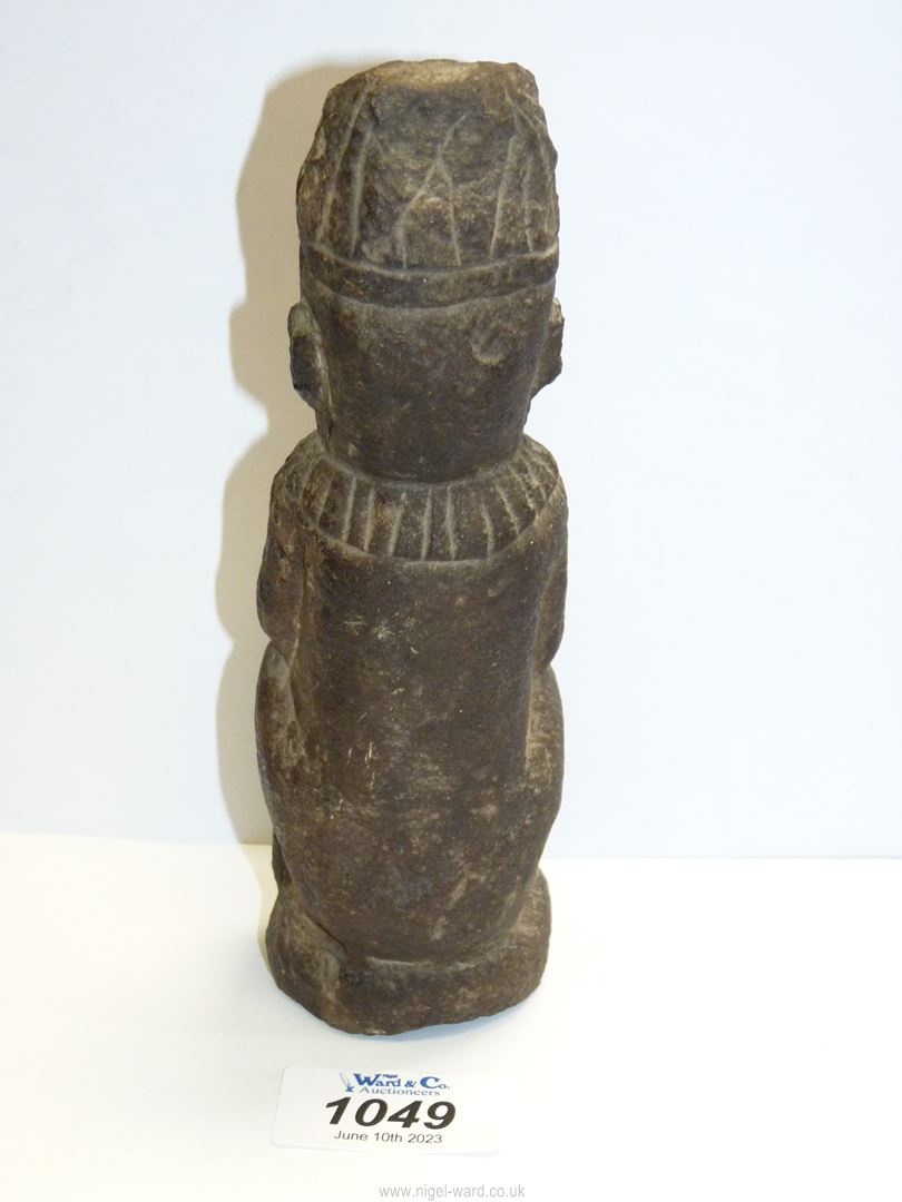 A Stone carved figure of a seated man with clasped hands, wearing head piece and collar, 7" tall. - Image 2 of 3