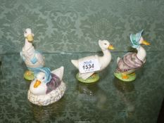 Four Beswick Beatrix Potter figures Rebecca Puddle Duck,