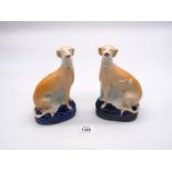 A Pair of Victorian Staffordshire Greyhounds, crazed, approx. 7 3/4" tall.