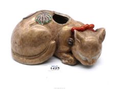 An unusual Japanese Hirado porcelain figure of a cat, finely painted in life like colours,