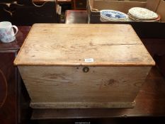 A small vintage Pine school tuck box/chest of small dimensions, 25" x 15 1/8" x 14 1/4" high.
