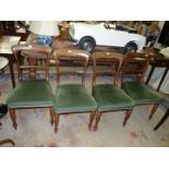 A set of four 19th c Rosewood framed Dining Chairs standing on turned front legs and having green