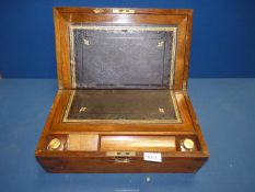 A satinwood Writing box with brass corners, leather writing slope, glass inkwells,